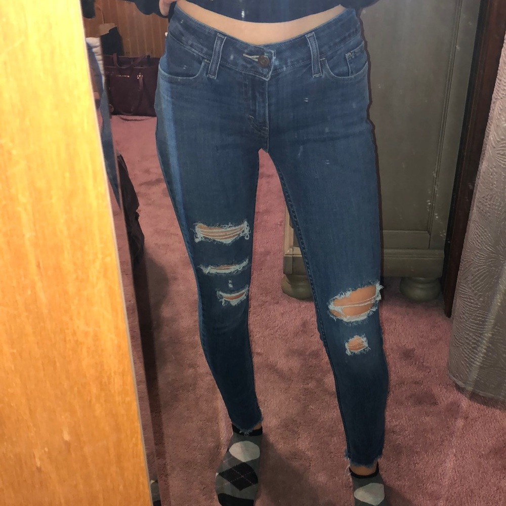 Levi’s 535 Super Skinny Distressed Jeans
